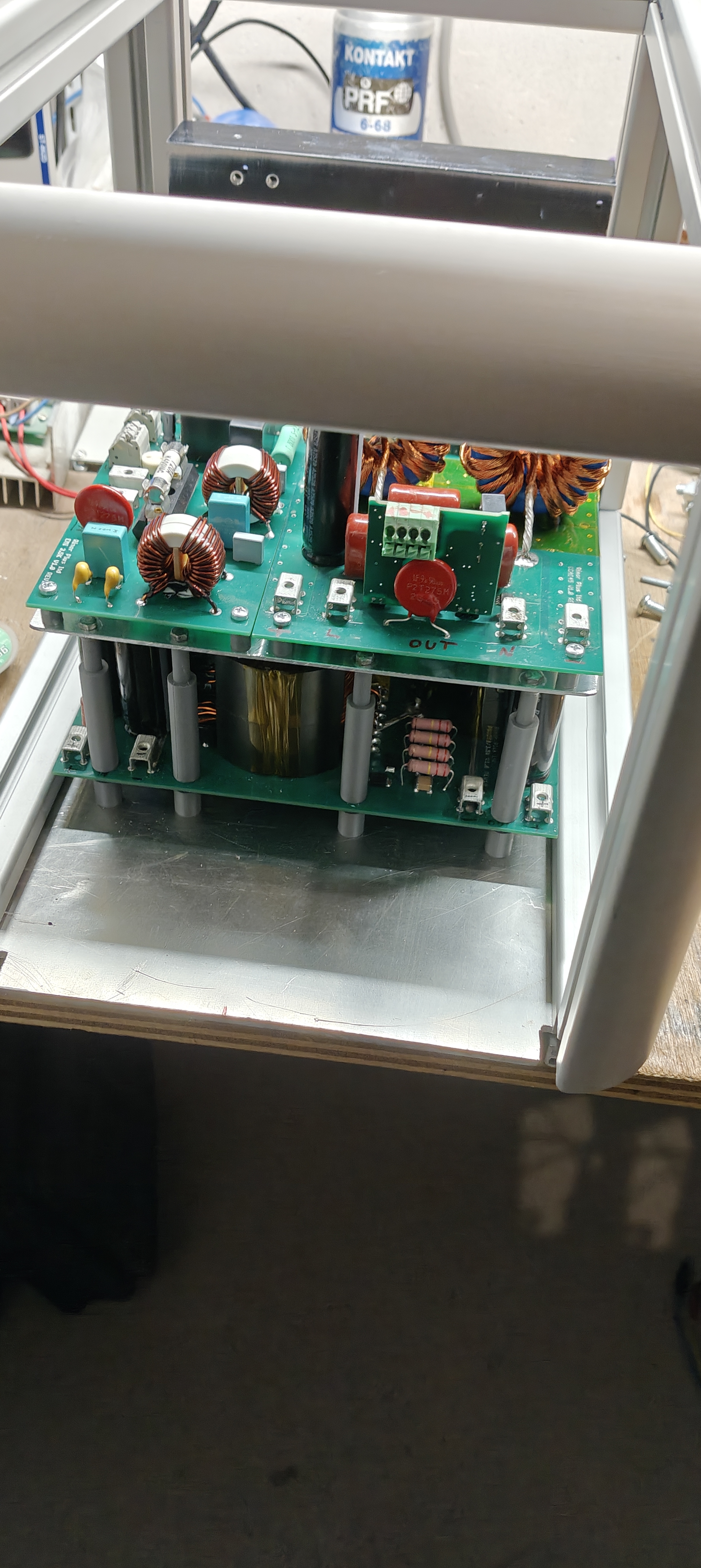 Stacked electronics assembly mounted inside the instrument frame.